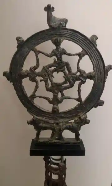 Four men holding hands in the form of a cross